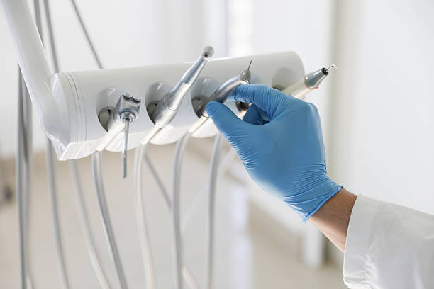Professional Emergency Dentist technician working in South Farmingdale, NY